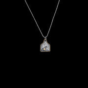 The Goldhorn Eartag Pendant