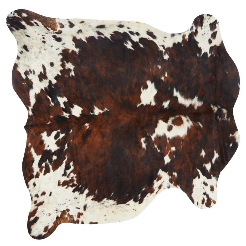 Brown and White Cowhide Rug