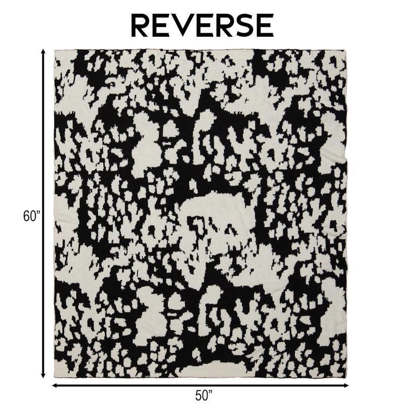 Carstens Black and White Cowhide Stretchy Throw