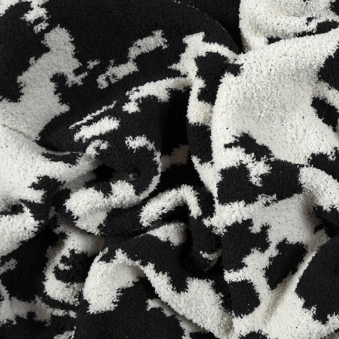 Carstens Black and White Cowhide Stretchy Throw