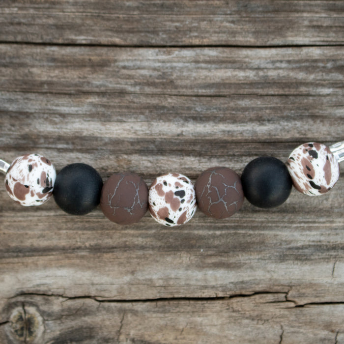 NRS Black Brown Cow Print Silicone Beaded Curb Strap