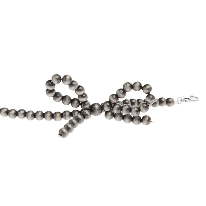 Wild Junkie Pearl Bow Trucker Hat Chain